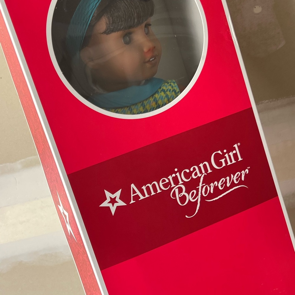 American girl melody doll with book